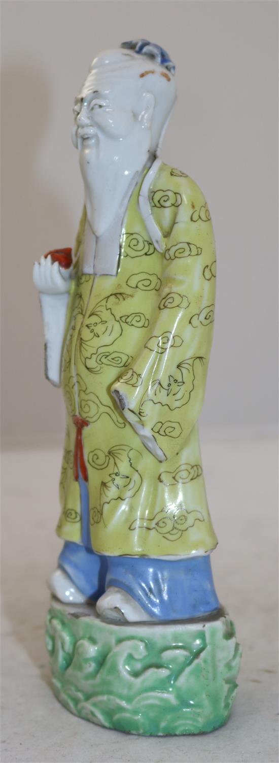 A Chinese enamelled porcelain figure of Shou Lao, 18th/19th century, height 22cm